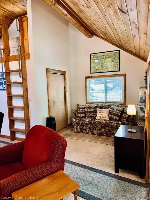 Living - 111 Petoskey Dr, Roscommon, MI 48653 photo 2 of 5
