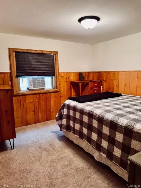 Bedroom - 111 Petoskey Dr, Roscommon, MI 48653 photo 1 of 4
