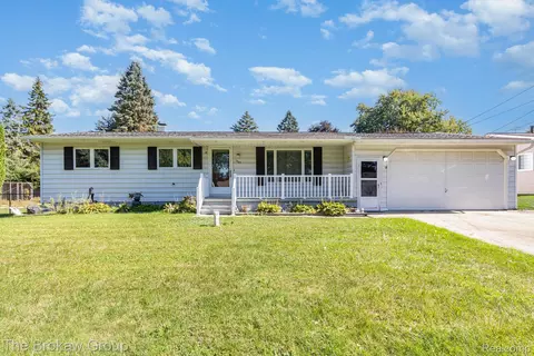 1409 S Genevieve St, Burton, MI 48509