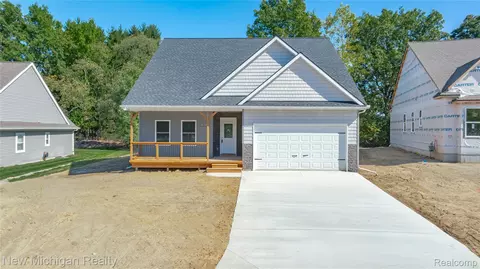 7448 Village Ct, Springfield, MI 48350