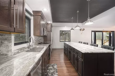 Kitchen - 6803 Napoleon Rd, Leoni, MI 49201 photo 4 of 9