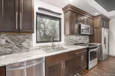 Kitchen - 6803 Napoleon Rd, Leoni, MI 49201 photo 3 of 9
