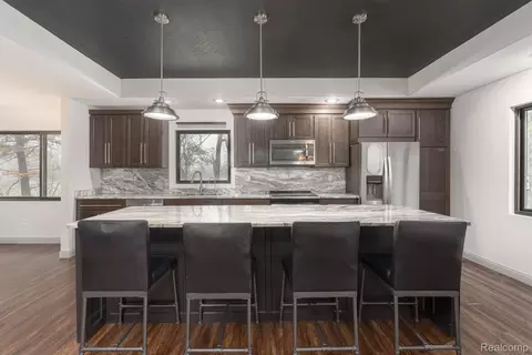 Kitchen - 6803 Napoleon Rd, Leoni, MI 49201 photo 7 of 9