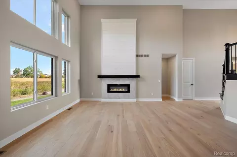 Living - 23947 Sawgrass Dr, Macomb, MI 48042 photo 7 of 8