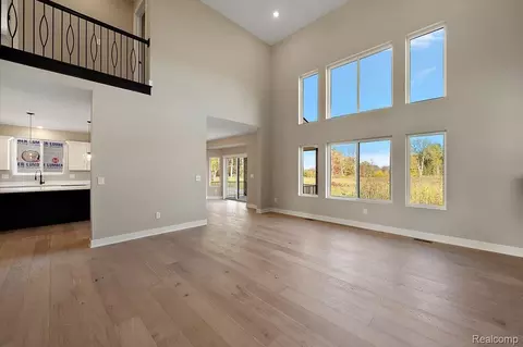 Living - 23947 Sawgrass Dr, Macomb, MI 48042 photo 1 of 8