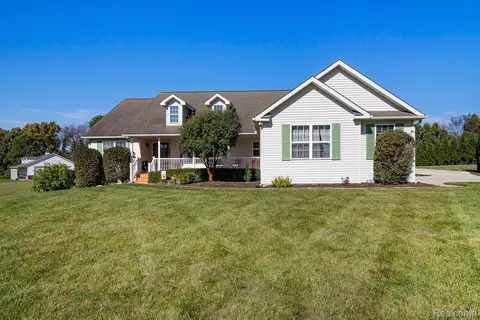 703 N Hughes Rd, Oceola, MI 48843