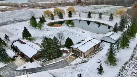 7383 Fisher Rd, Grant, MI 48032