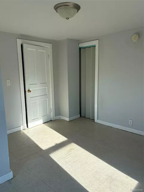 Bedroom - 1214 Root St, Flint, MI 48503 photo 4 of 12