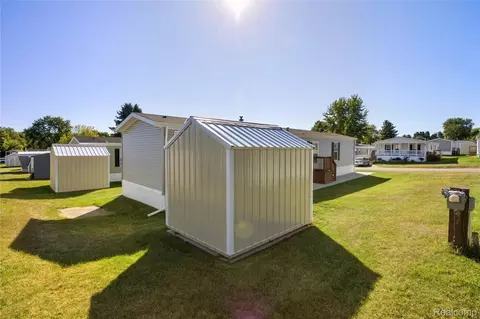 Exterior - 230 E Macgregor Ct, Highland, MI 48357 photo 1 of 8