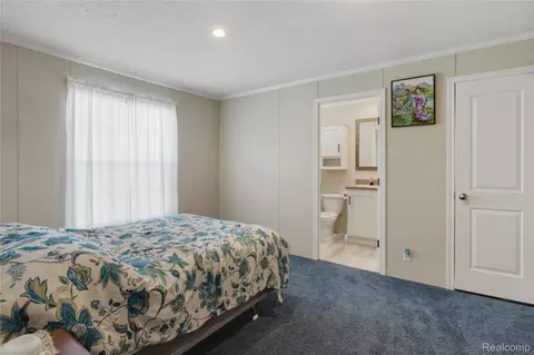 Bedroom - 230 E Macgregor Ct, Highland, MI 48357 photo 1 of 5