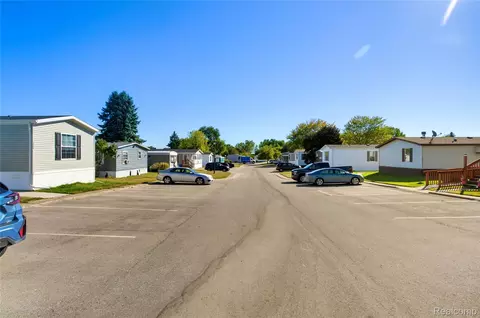 Exterior - 230 E Macgregor Ct, Highland, MI 48357 photo 3 of 8
