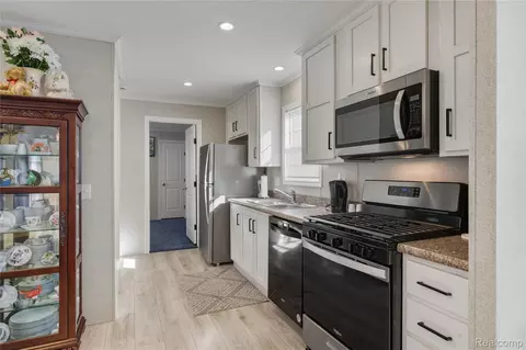 Kitchen - 230 E Macgregor Ct, Highland, MI 48357 photo 1 of 2