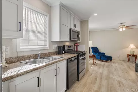 Kitchen - 230 E Macgregor Ct, Highland, MI 48357 photo 2 of 2