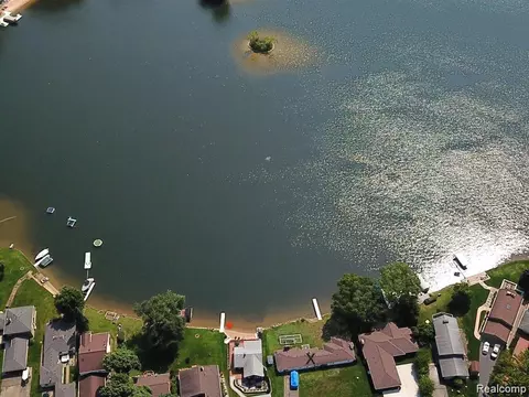 8461 Woodland Shore Dr, Brighton, MI 48114