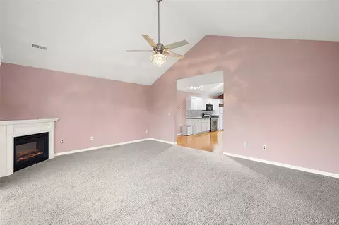 Living - 45765 Cagney Dr, Macomb, MI 48044 photo 2 of 3