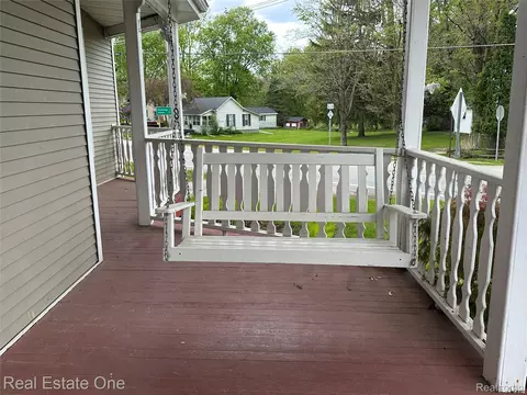Exterior - 103 Stockbridge St, Unadilla, MI 48137 photo 4 of 7