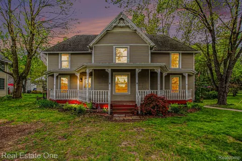 Exterior - 103 Stockbridge St, Unadilla, MI 48137 photo 2 of 7