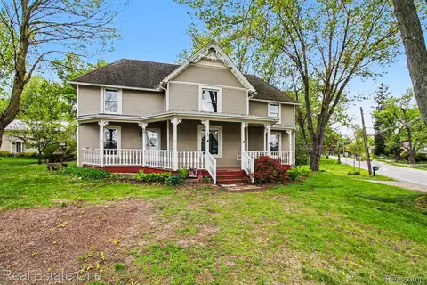 Exterior - 103 Stockbridge St, Unadilla, MI 48137 photo 3 of 7
