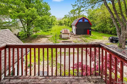 Exterior - 103 Stockbridge St, Unadilla, MI 48137 photo 6 of 7