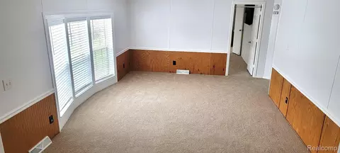 Living - 443 Pond View Dr, Morrice, MI 48857 photo 2 of 2