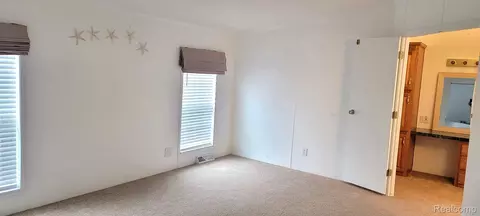 Bedroom - 443 Pond View Dr, Morrice, MI 48857 photo 3 of 4