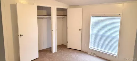 Bedroom - 443 Pond View Dr, Morrice, MI 48857 photo 2 of 4