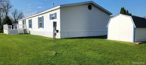Exterior - 443 Pond View Dr, Morrice, MI 48857 photo 2 of 5