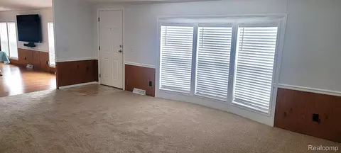 Living - 443 Pond View Dr, Morrice, MI 48857 photo 1 of 2
