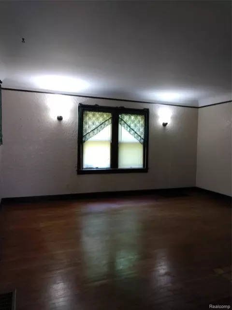 Living - 2212 Hoff St, Flint, MI 48506 photo 5 of 6