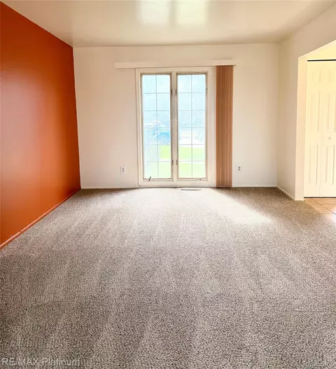Living - 3428 River Birch Dr, Flint, MI 48532 photo 2 of 2