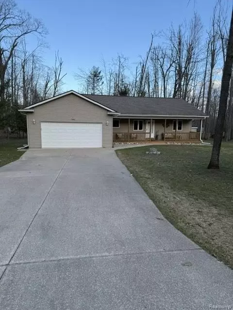 6767 Whispering Pines Dr, Gaylord, MI 49735