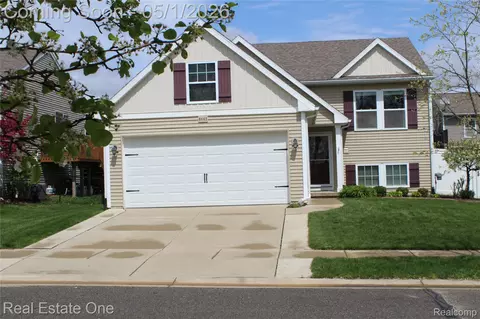 8662 Pinnebog River Dr, Handy, MI 48836