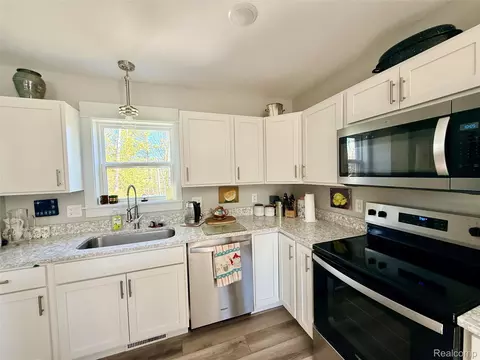 Kitchen - 9220 S Flaska Dr, Solon, MI 49621 photo 2 of 5