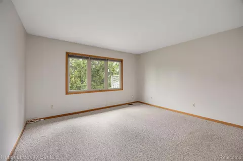 Living - 16061 Meadows Dr, Macomb, MI 48044 photo 4 of 4