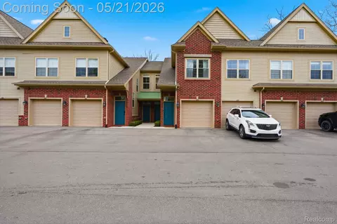 606 Pointe Dr, Walled Lake, MI 48390