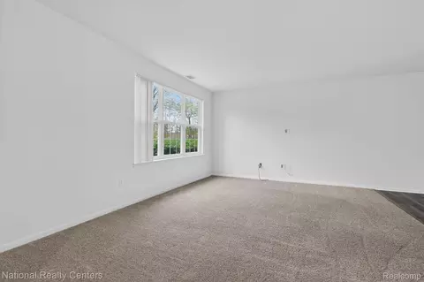 Living - 4371 Aster Blvd, Genoa, MI 48843 photo 1 of 5
