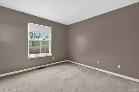 Bedroom - 4371 Aster Blvd, Genoa, MI 48843 photo 1 of 4