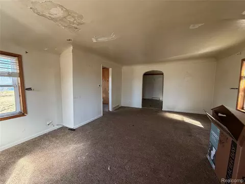 Living - 1038 W Pine Ave, Mount Morris, MI 48458 photo 2 of 2