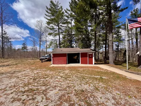 Exterior - 10931 Roberts Rd N, Maple Forest, MI 49733 photo 7 of 14