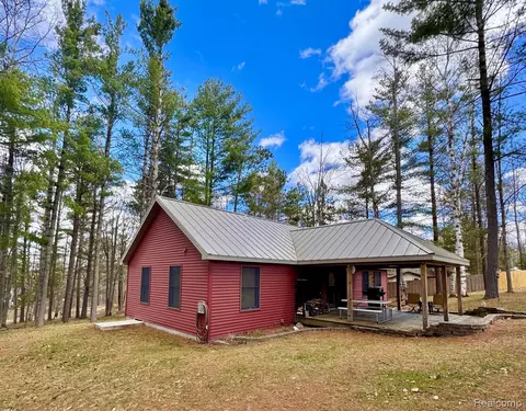 Exterior - 10931 Roberts Rd N, Maple Forest, MI 49733 photo 2 of 14