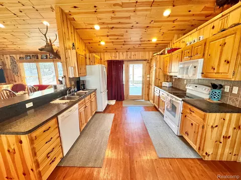 Kitchen - 10931 Roberts Rd N, Maple Forest, MI 49733 photo 2 of 3