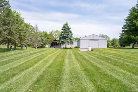 Exterior - 4610 Clyde Rd, Oceola, MI 48855 photo 7 of 10
