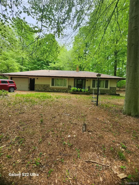 7110 Thom Dr, Burnside, MI 48416