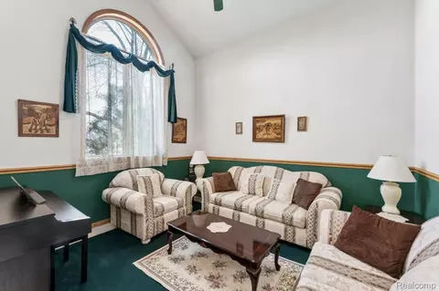 Living - 6476 Stonebrook Ln, Flint, MI 48433 photo 6 of 7