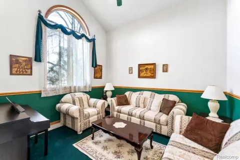 Living - 6476 Stonebrook Ln, Flint, MI 48433 photo 3 of 7