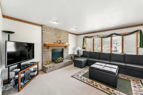 Living - 6476 Stonebrook Ln, Flint, MI 48433 photo 4 of 7