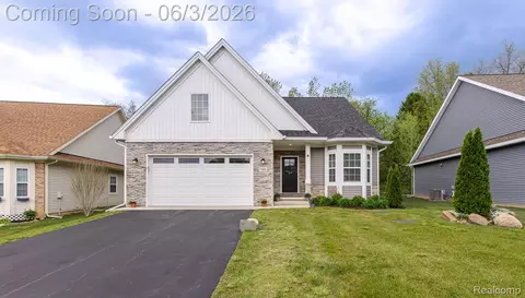 7466 Village Ct, Springfield, MI 48350