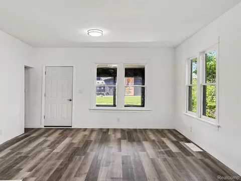 Living - 1123 E 1st St, Monroe, MI 48161 photo 1 of 3