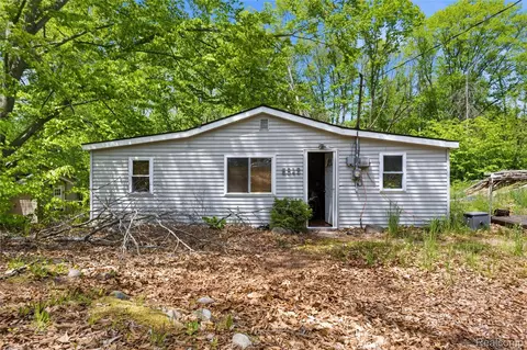 5842 Woodland Dr, Surrey, MI 48632