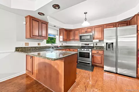 Kitchen - 18238 Red Oaks Dr, Macomb, MI 48044 photo 2 of 2